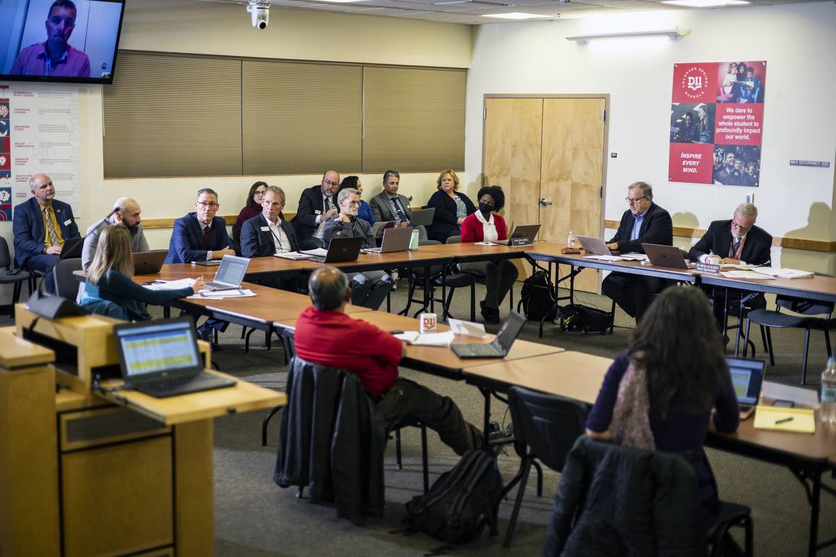 A meeting of the Colorado Springs District 11 School Board in large board room