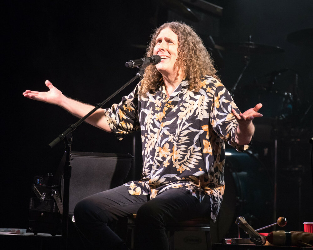 Weird Al Yankovic performs on stage
