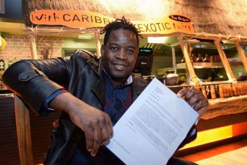 Apollo posing in restaurant 