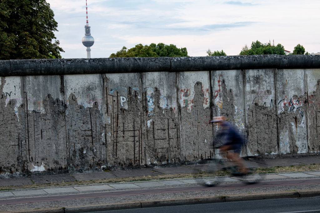 Cyclist at Berlin Wall