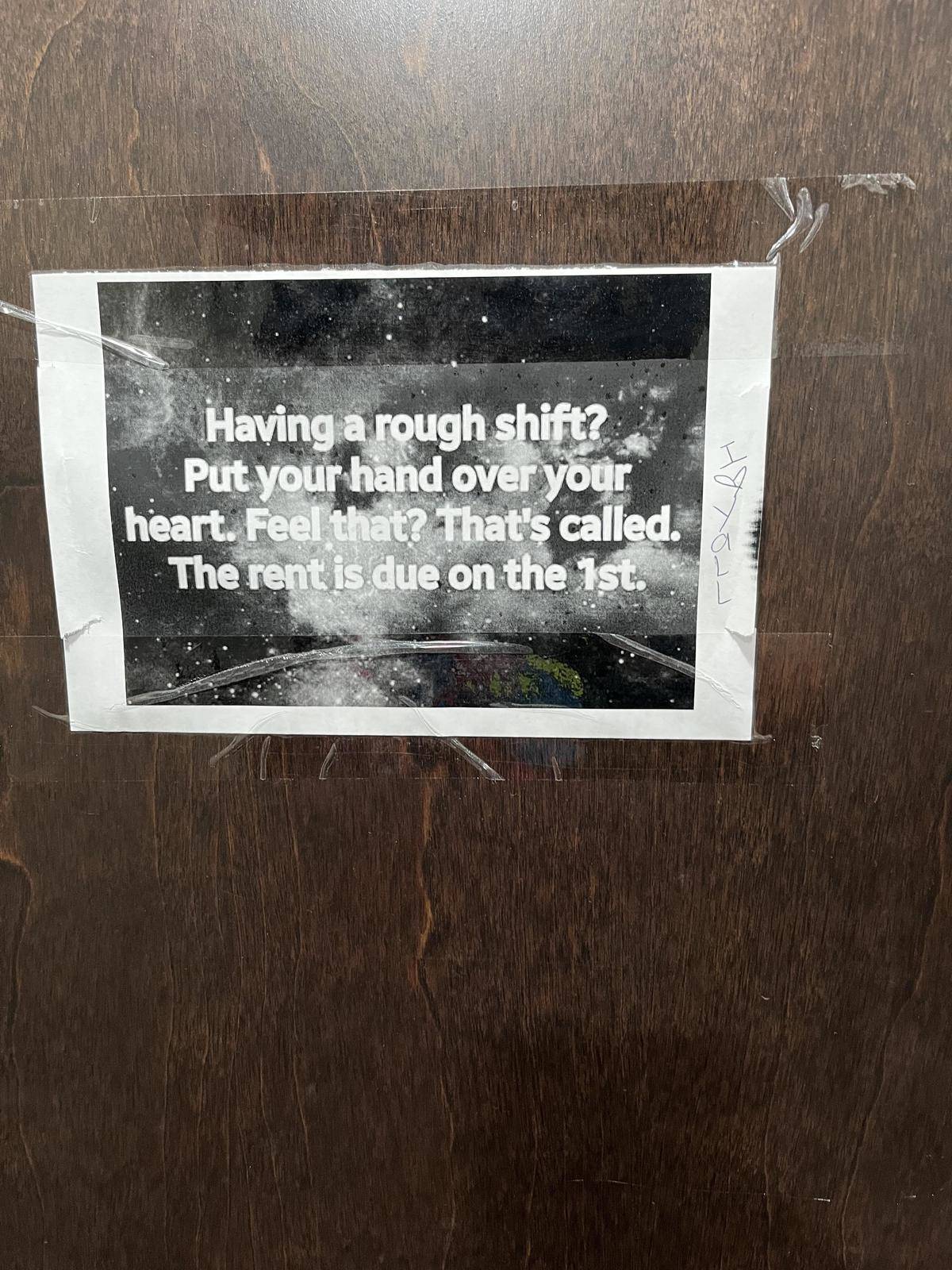 Sign: Having a rough shift? Put your hand over your heart. Feel that? That's called the rent is due on the 1st.