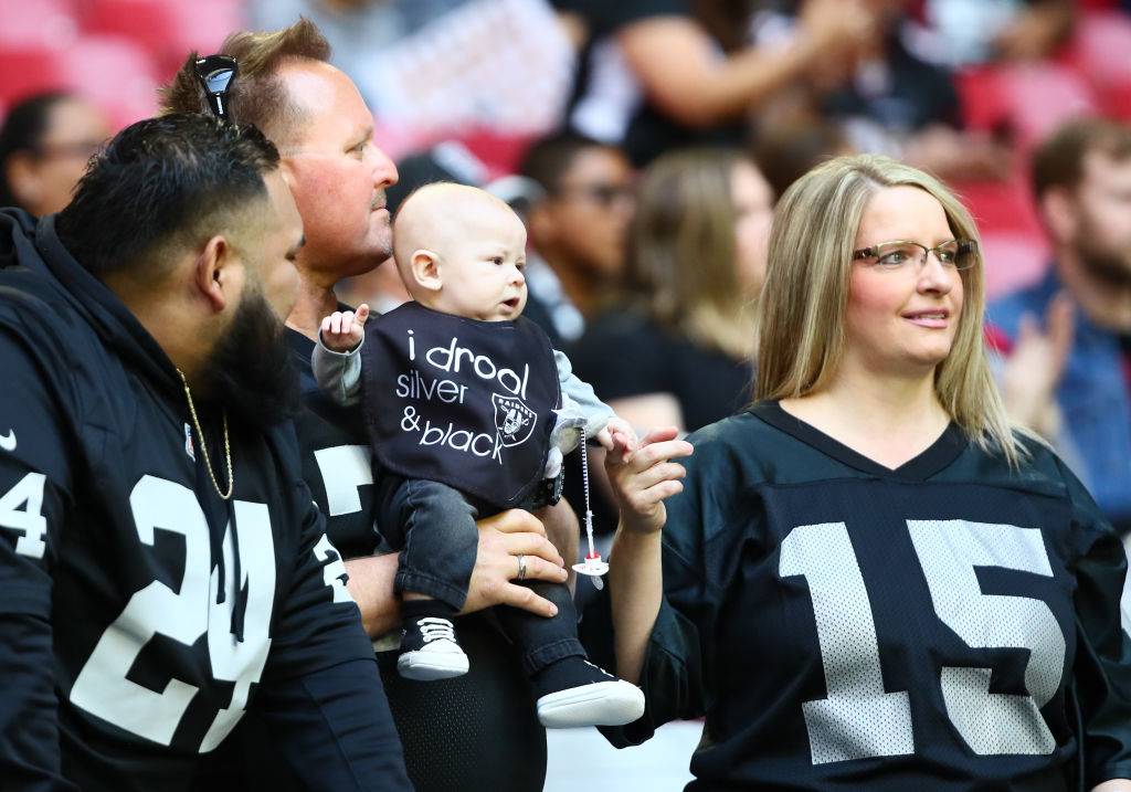 Baby wearing Raiders clothes