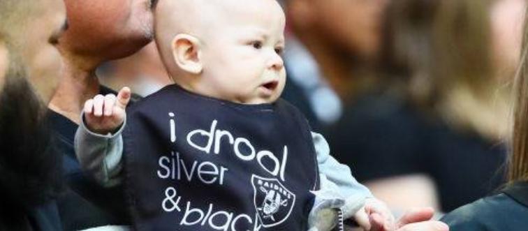 Baby wearing Raiders clothes