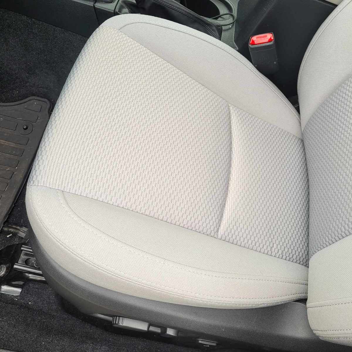 Drivers seat with grey upholstery