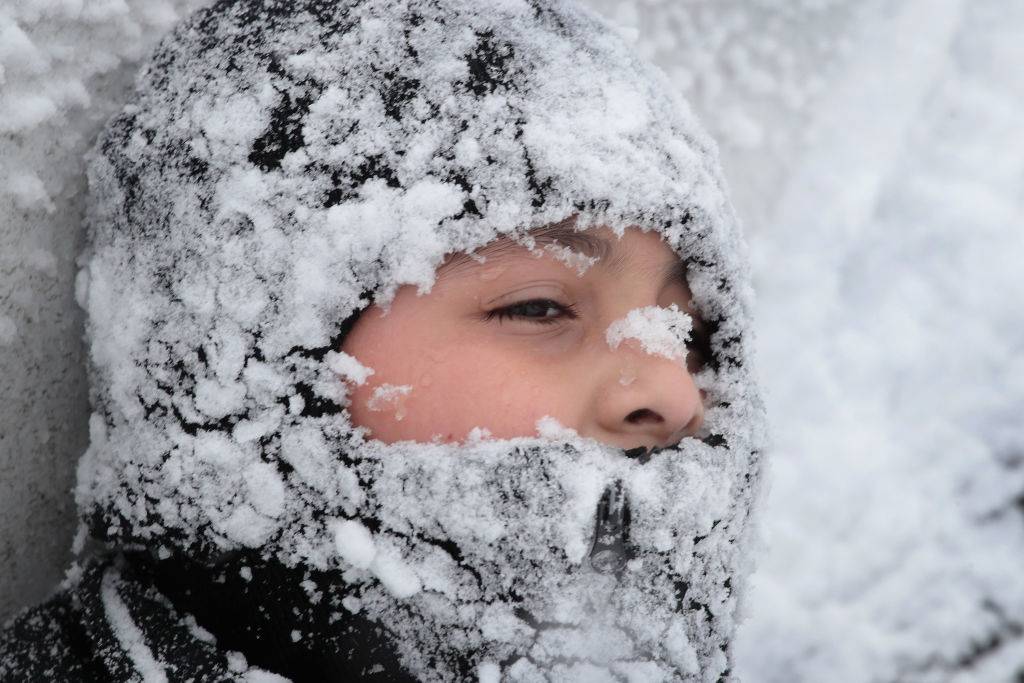 Snow-covered boy