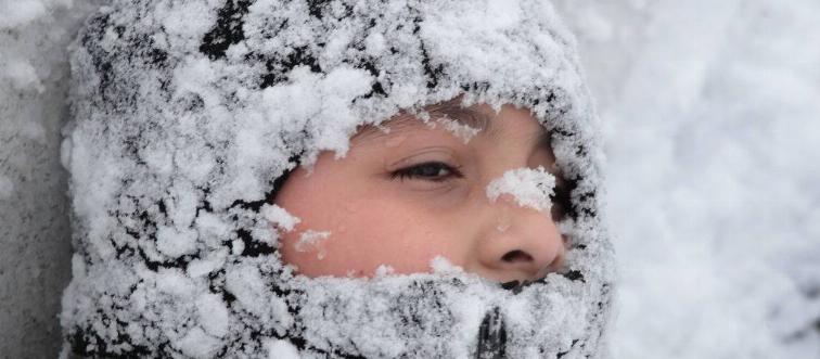 Snow-covered boy