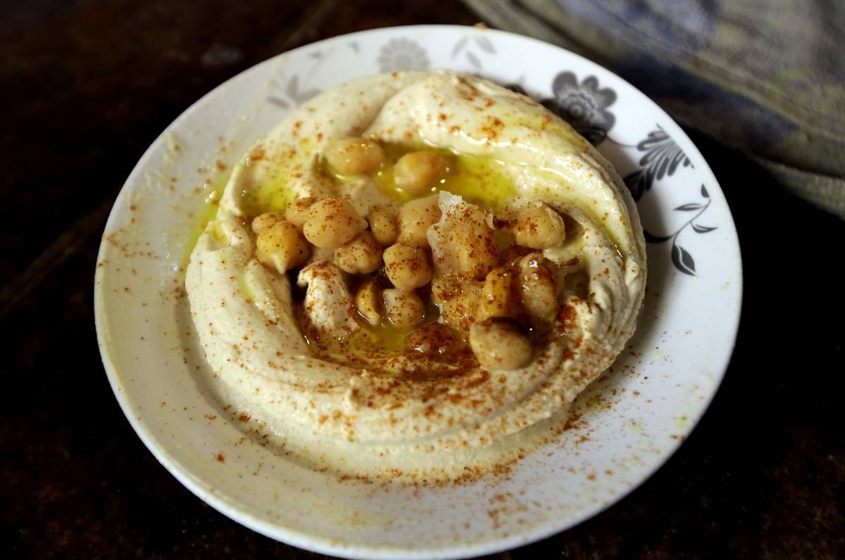 Hummus A plate of Hummus is served at a restaurant in the Lebanese coastal city of Tripoli, north of Beirut on October 20, 2014.