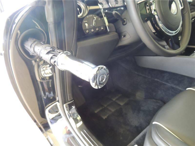 umbrella compartment in the door of a vehicle