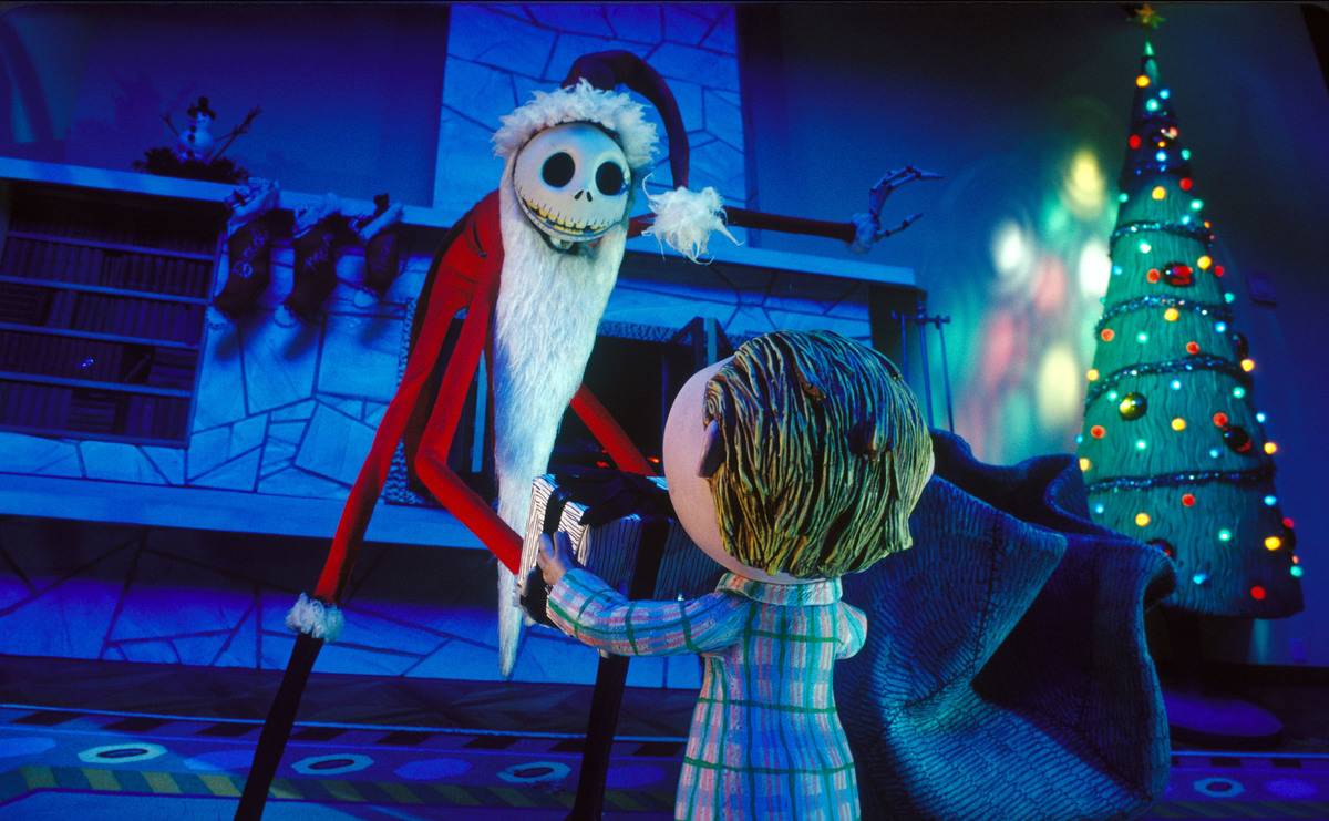 Jack Skellington greets child in Santa suit