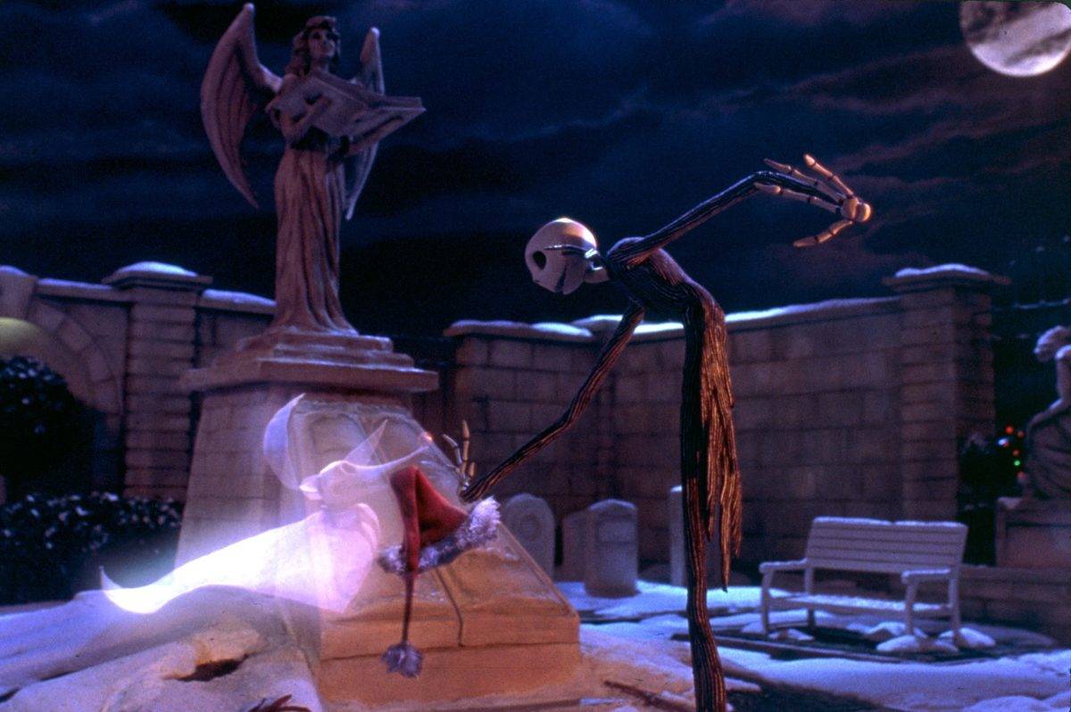 Jack Skellington taking Santa hat from Zero the ghost dog in The nightmare Before Christmas