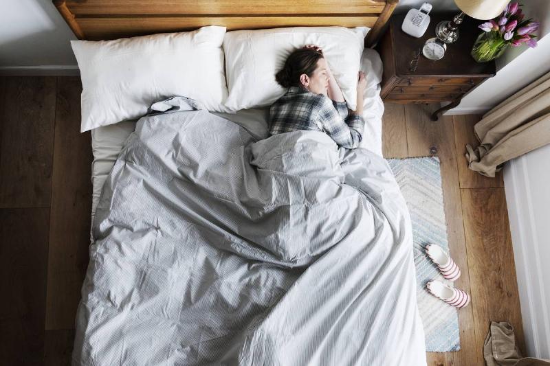 caucasian-woman-on-bed-sleeping-2022-09-16-08-58-06-utc