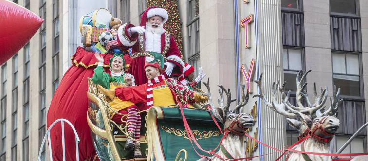 Float with Santa Claus concludes 96th Macy's Thanksgiving Day Parade along streets of New York.