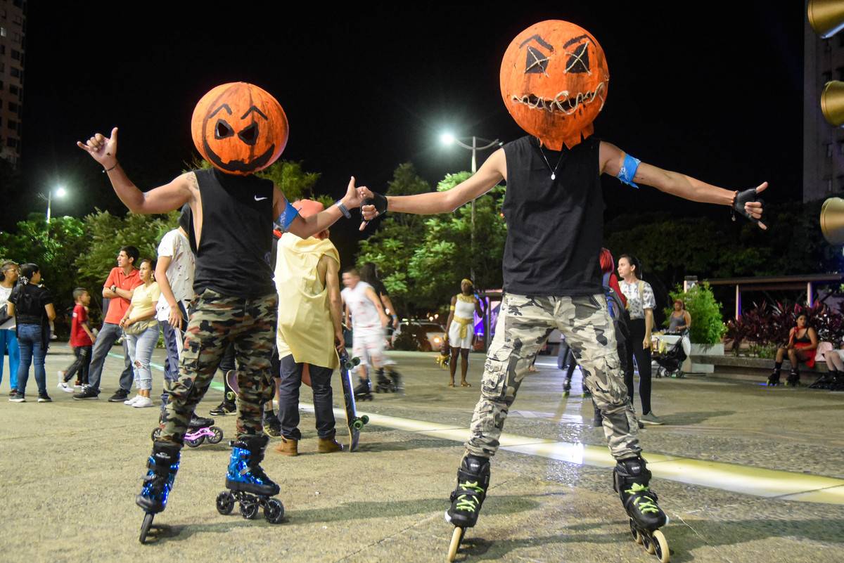 Participants are seen with costumes during the Halloween Parade in Cali, Colombia on October 30, 2022.