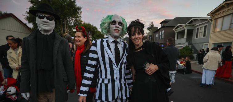 Parade participants in costume attend the 2022 Halloween parade in Sausalito, California, United States on October 31, 2022.