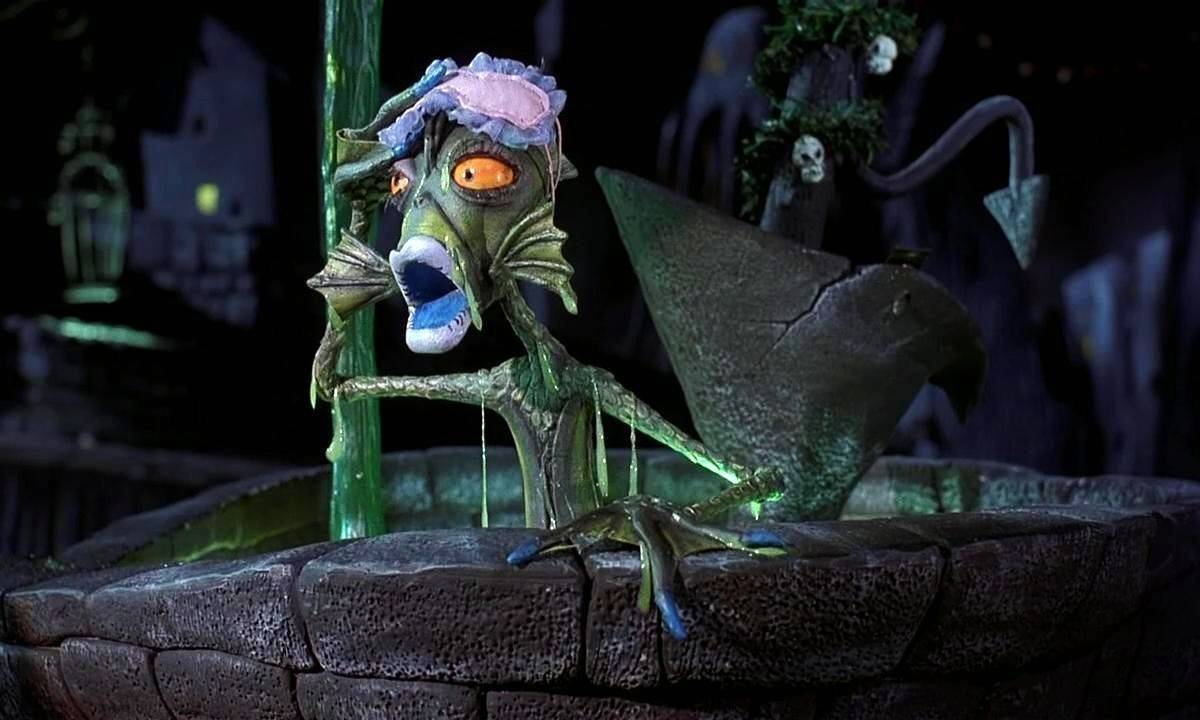monster looking shocked with sleeping blinders while emerging from well