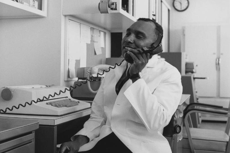 Physician Talks On The Phone