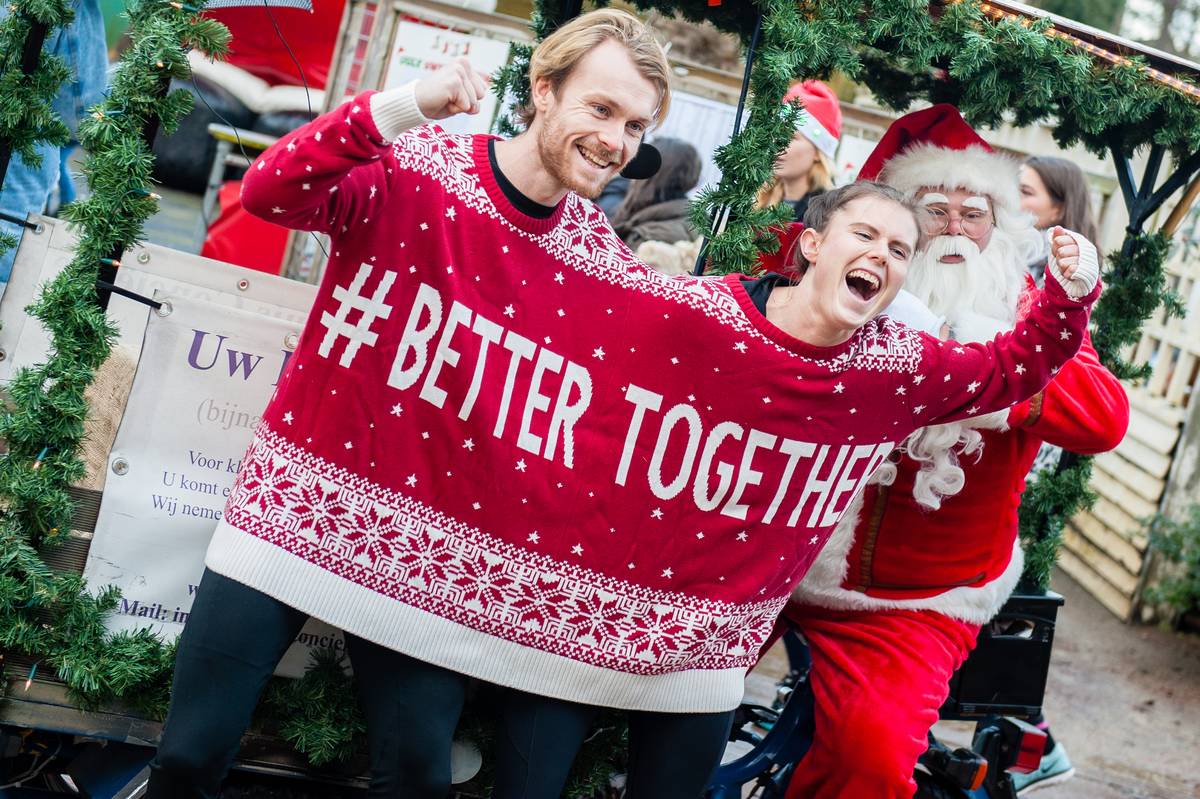 People take part in an Ugly Christmas Sweater Run on December 16, 2017 in The Vondelpark in Amsterdam, Netherland.