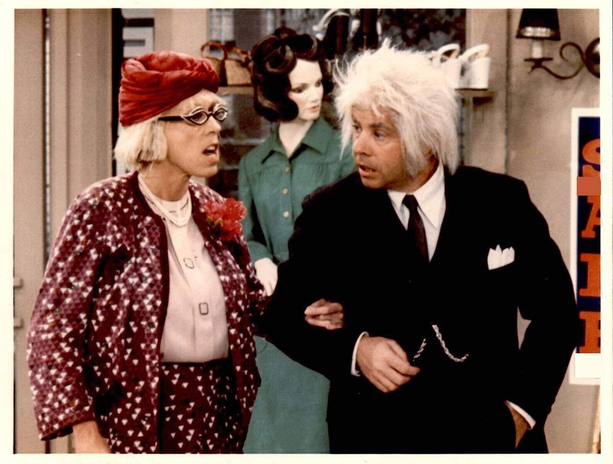 Carol Burnett and Tim Conway playing characters on The Carol Burnett Show