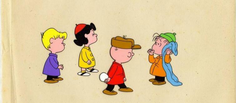 Schroeder, Lucy, Linus, and Charlie Brown standing with snowballs in A Charlie Brown Christmas