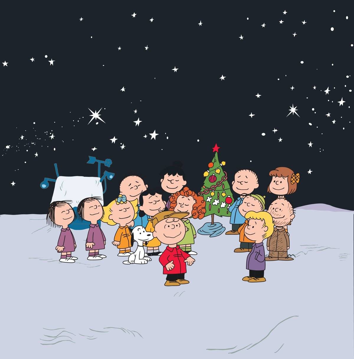 children happily standing around decorated Christmas tree in A Charlie Brown Christmas