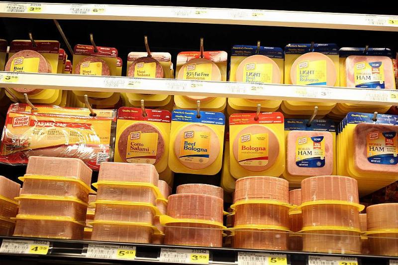 deli meat 494330622 Processed meats are displayed in a grocery store
