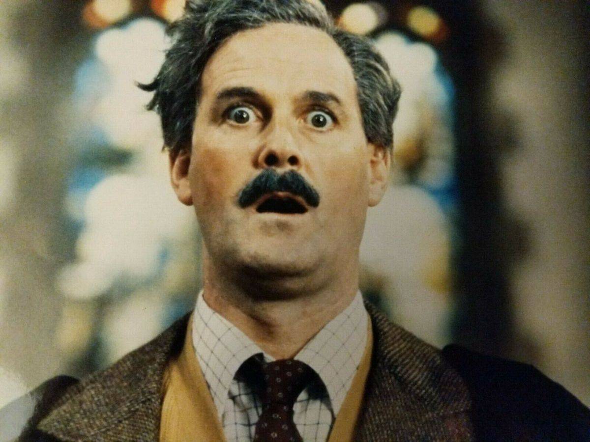 John Cleese looking horrified as Basil Fawlty