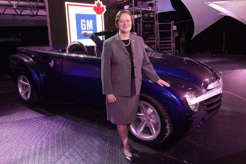 Maureen Kempston Darks, pres. of GM, posing with a SSR, SUPER SPORT ROADSTER WHICH WILL BE ON THE MA