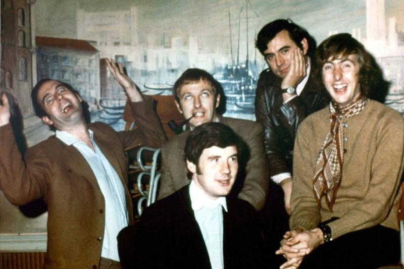 The cast of Monty Python's Flying Circus making silly faces