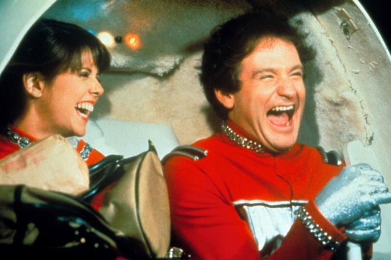 Robin Williams and Pam Dawber laughing in Mork and Mindy