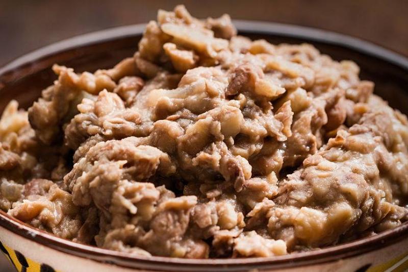 refried beans 525288878 refried beans in a bowl