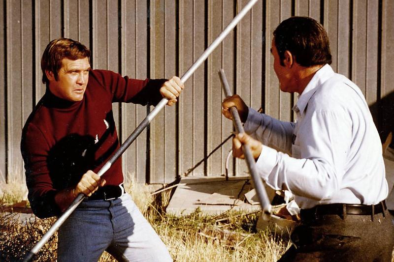 Lee Majors fighting John Saxon with pipe in The Six Million Dollar Man
