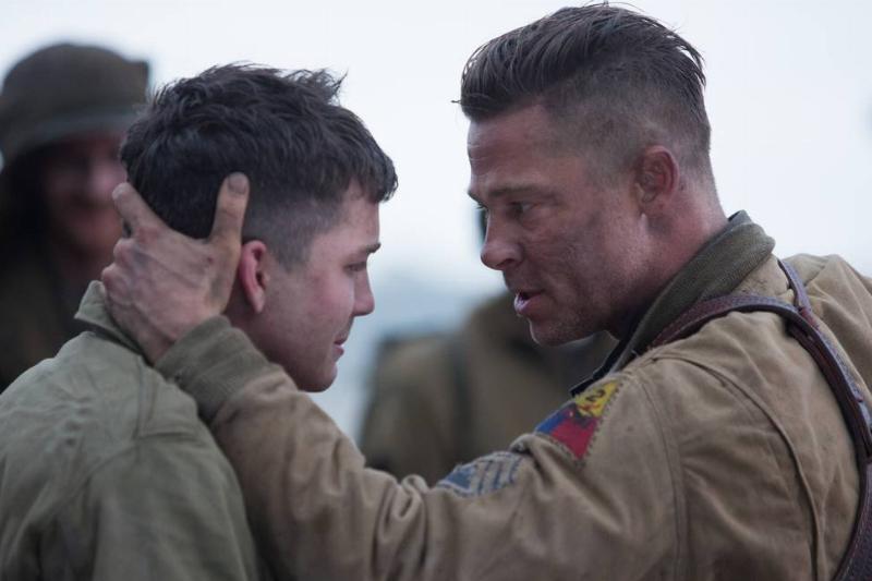 Brad Pitt grabbing the back of Logan Lerman's head in Fury Brad Pitt grabbing the back of Logan Lerman's head in Fury