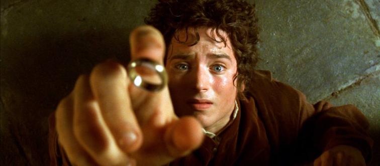 Elijah Wood nervously putting finger in ring as Frodo Baggins in The Lord Of The Rings Fellowship of The Ring