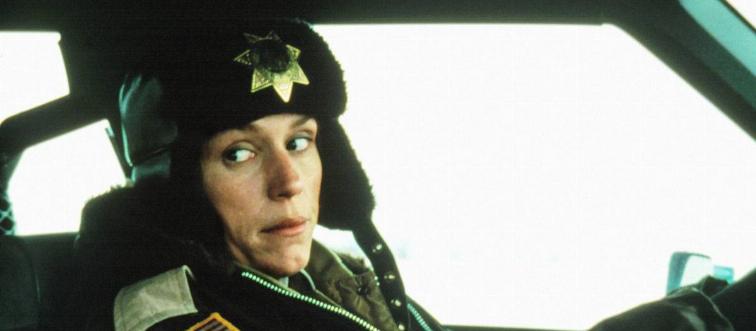 Frances McDormand driving police car as Marge Gunderson in Fargo