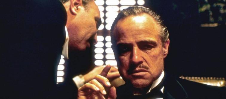 Marlon Brando as Vito Corleone listening to Salvatore Corsitto as Amerigo Bonasera in The Godfather