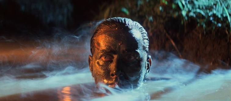 Martin Sheen rising out of water as Captain Benjamin Willard in Apocaylpse Now