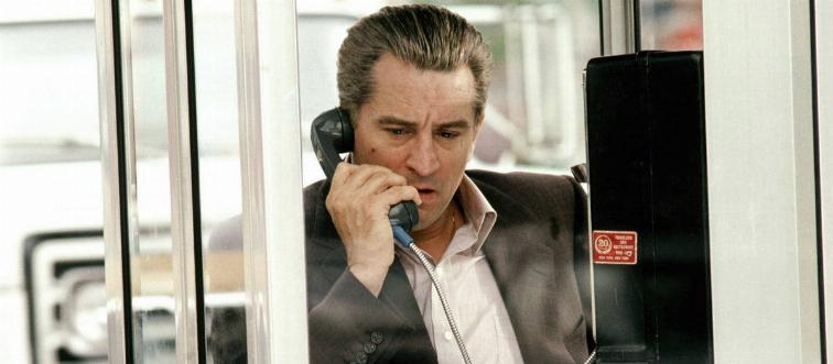 Robert De Niro talking on payphone as Jimmy Conway in Goodfellas