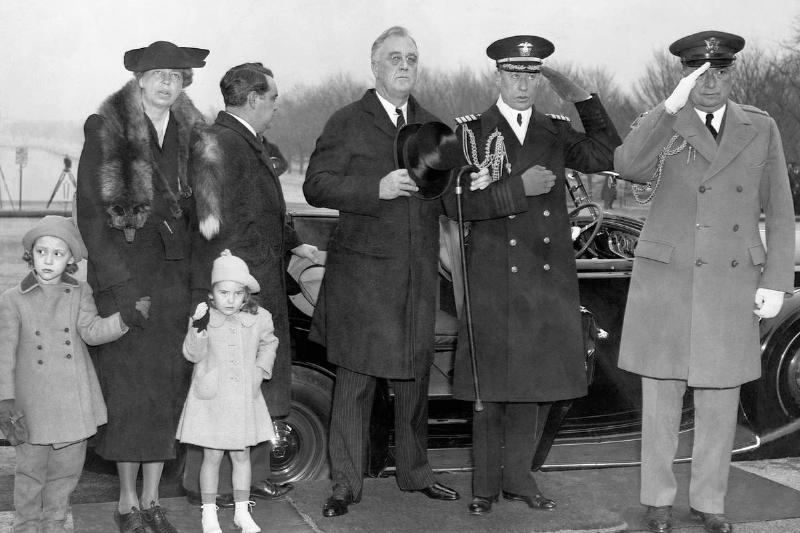 Franklin Roosevelt at a wreath-laying ceremony at the Lincoln Memorial.  From left to right, Diana Hopkins, Daughter of Harry Hopkins, Works 
Project Administrator; Eleanor Roosevelt, wife of the President; 
Chandler Roosevelt, daughter of Elliott Roosevelt, the President's son; 
President Franklin D. Roosevelt; his Naval Aide, Capt. Walter B. 
Woodson, and Col. Edwin Watson, his Military Aide.
