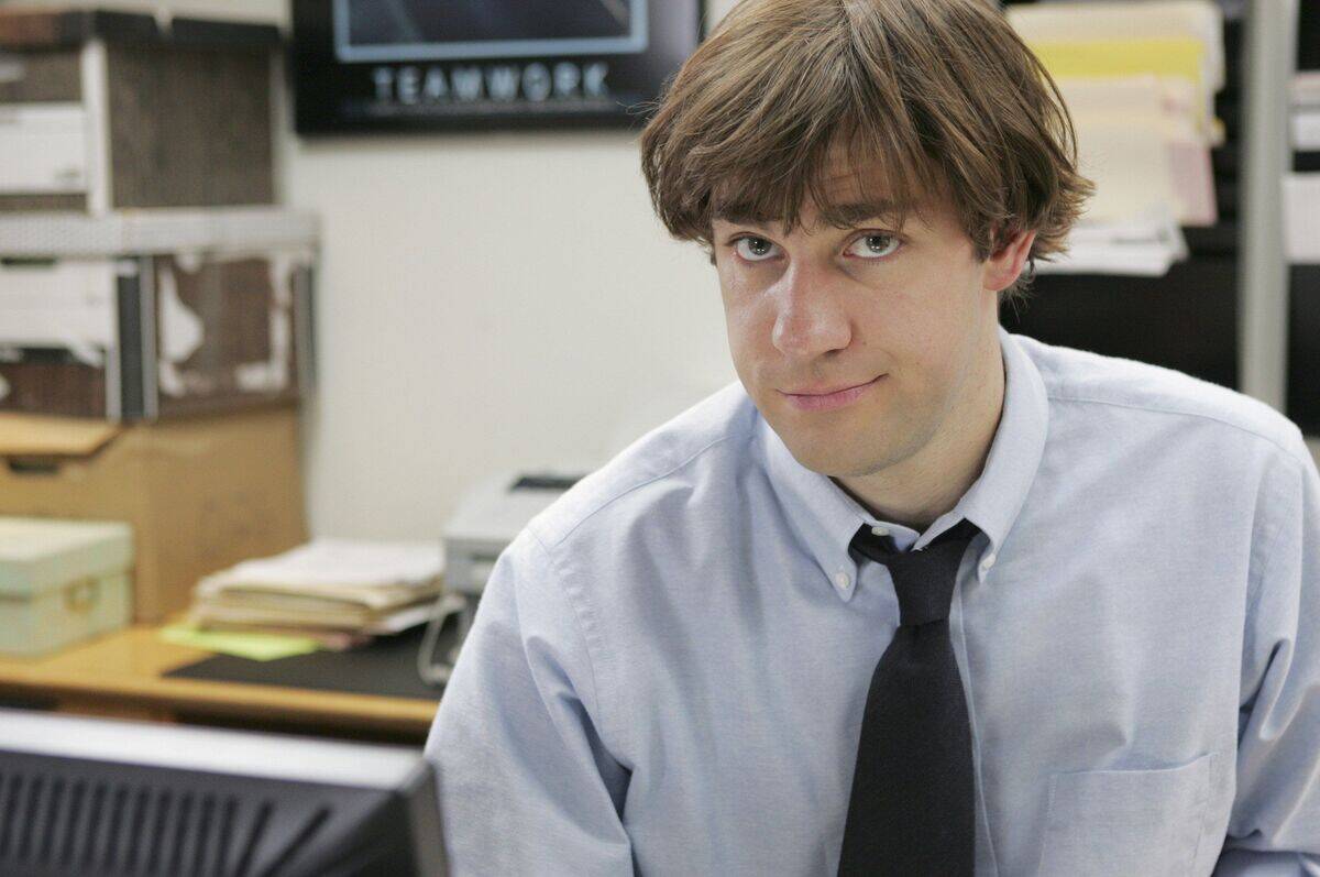 John Krasinski looking at the camera as Jim Halpert from The Office