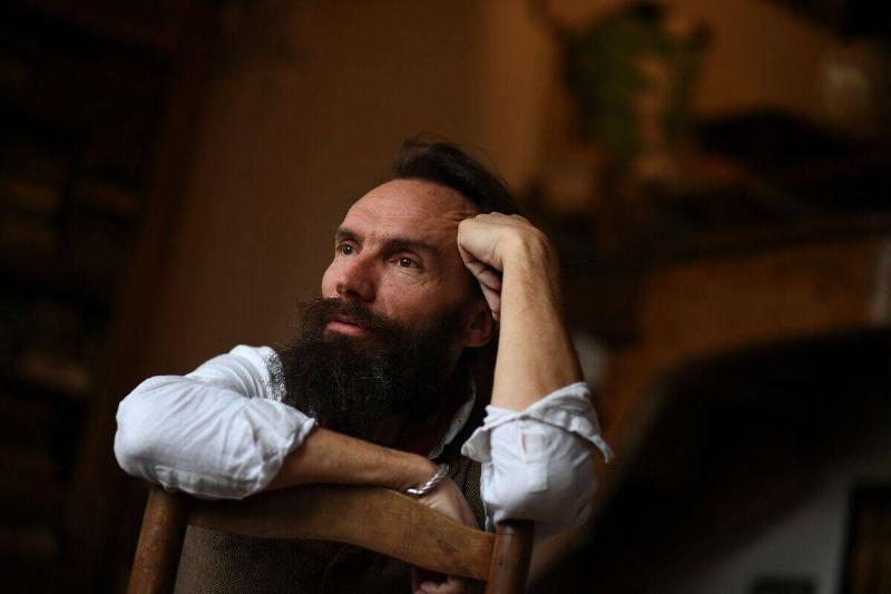 Ludovic Slimak, French National Centre for Scientific Research (CNRS)  researcher and archaeologist of the University of Toulouse, poses at his
 home in Saint-Laurent-sur-Save, southwestern France, on February 11, 
2022.