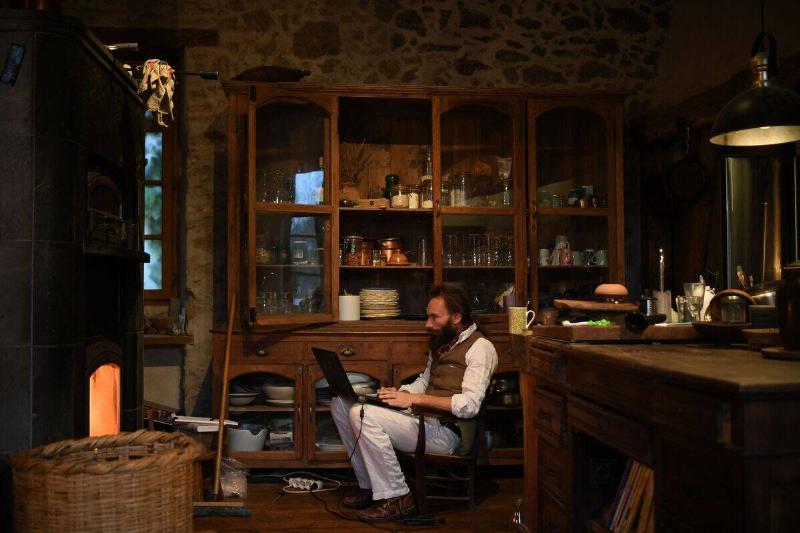 Ludovic Slimak, French National Centre for Scientific Research (CNRS)  researcher and archaeologist of the University of Toulouse, works at his
 home in Saint-Laurent-sur-Save, southwestern France, on February 11, 
2022.