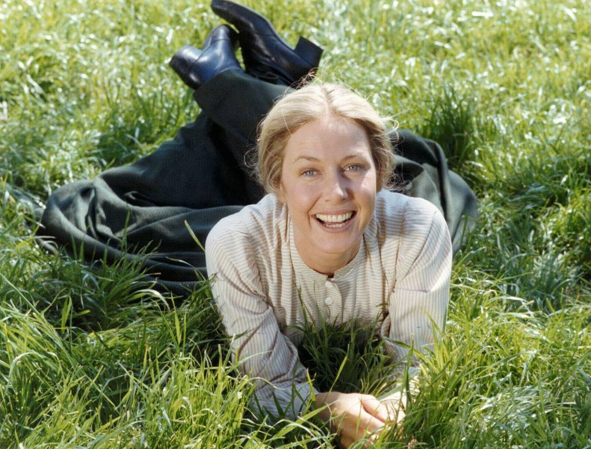 little house on the prairie karen grassle lying on the grass