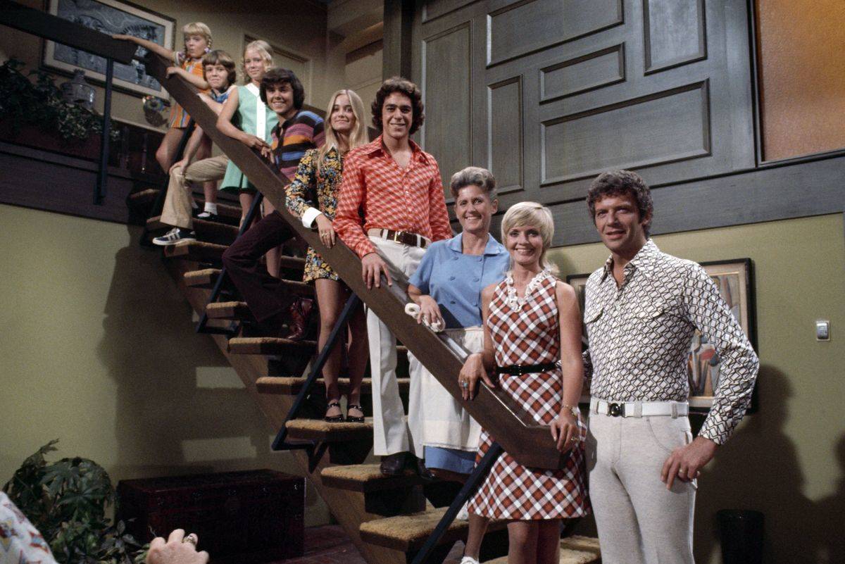 the brady bunch cast on the stairs