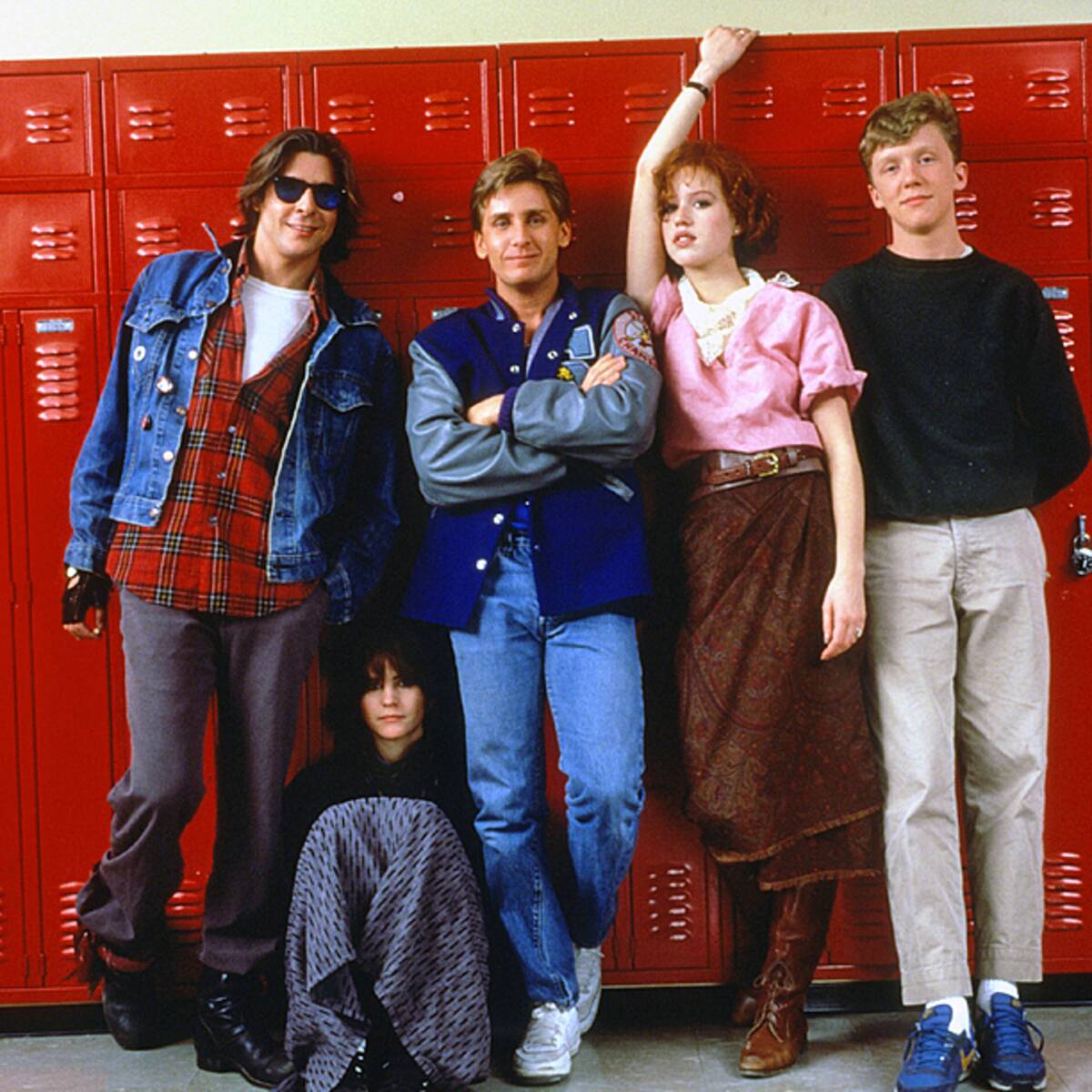cast of the breakfast club standing by red lockers