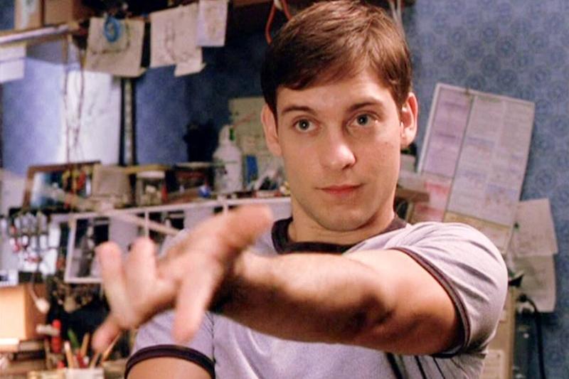 Tobey Maquire testing web powers in bedroom as Peter Parker in Spider-Man
