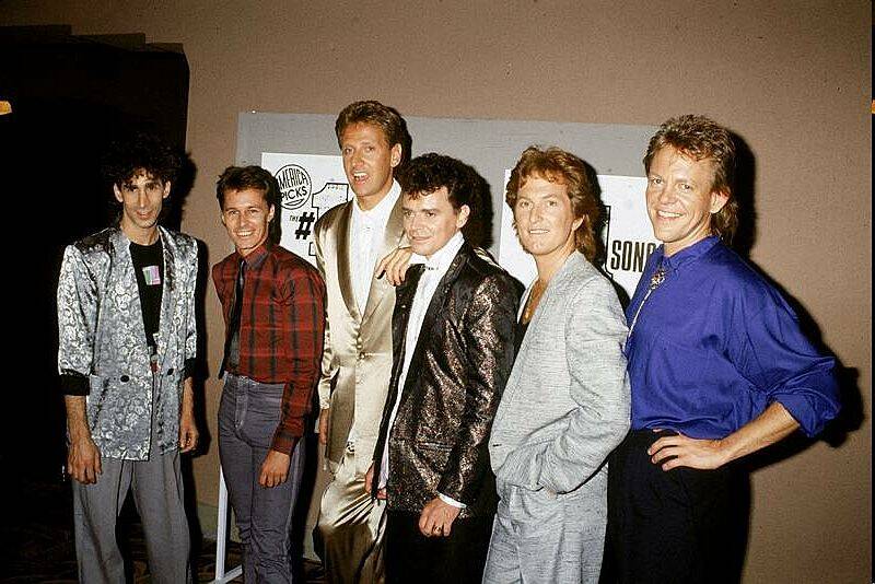 air supply posing for a photo