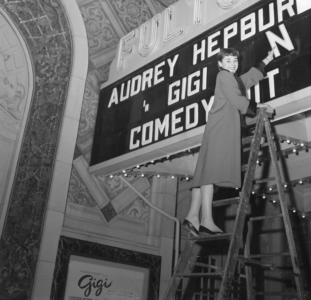 Audrey Hepburn Placing Letters on Marquee