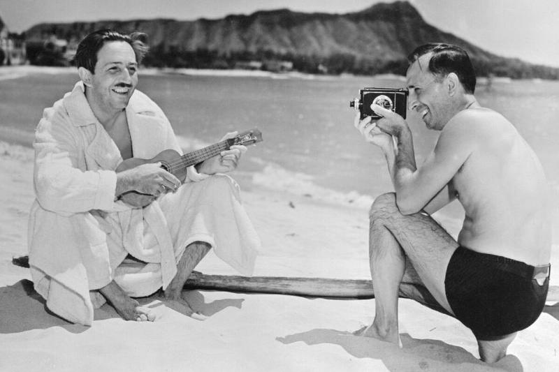 Walt Disney Being Photographed by His Brother Roy