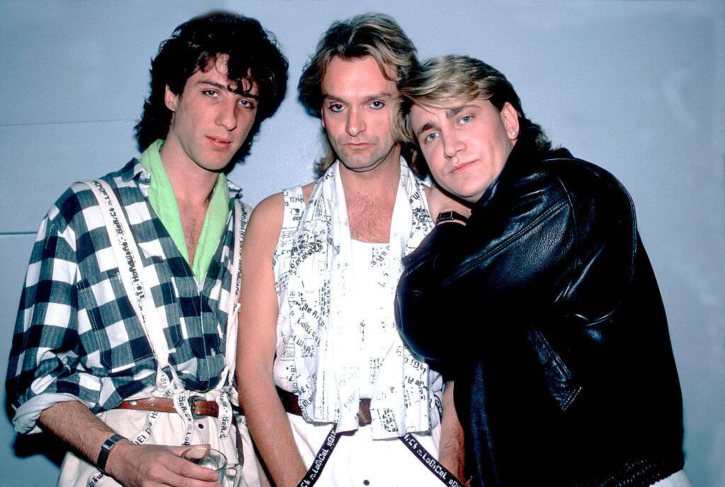 wang chung posing for a photo