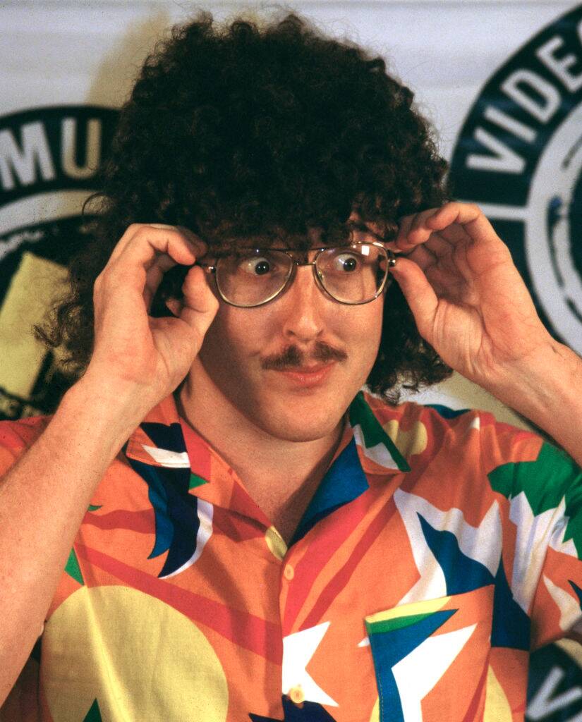 weird al posing for a photo